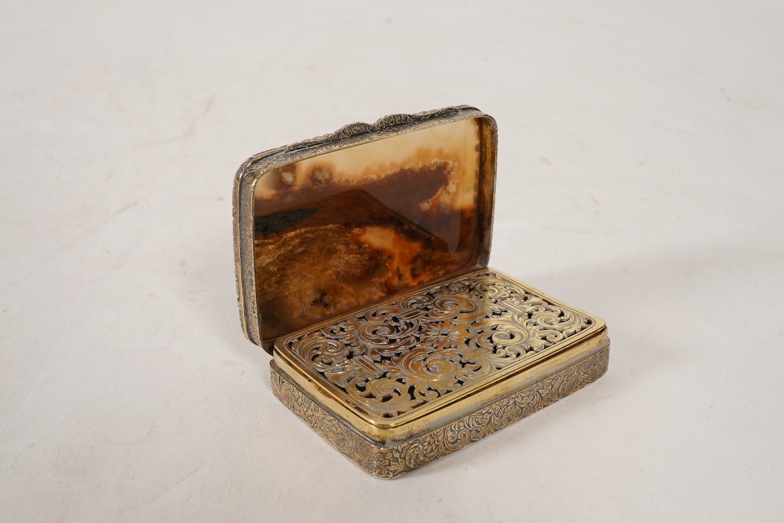 A Victorian large silver gilt vinaigrette with inset agate hinged cover, by John Harris